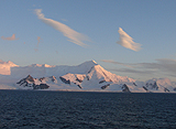 Sunrise on snow covered mountains